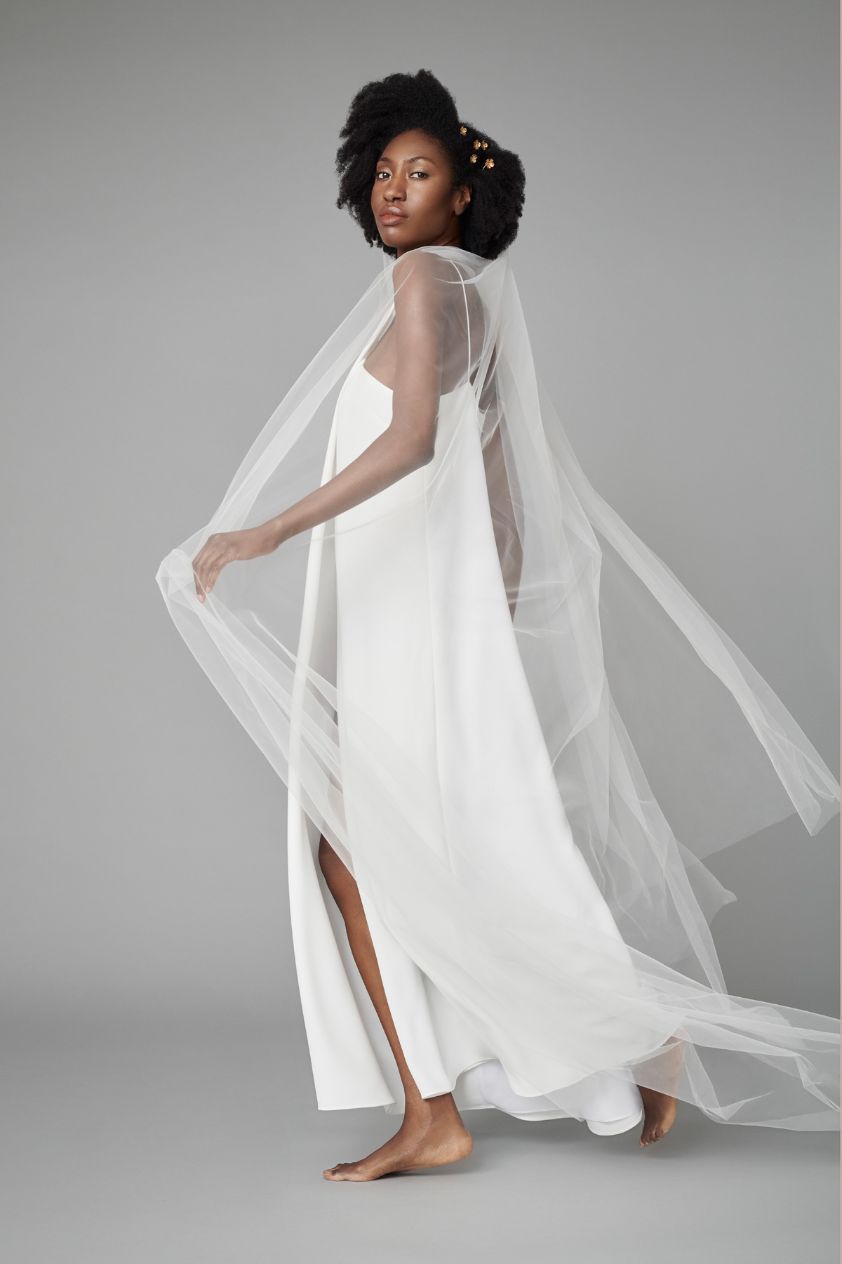 Black model in Rita Colson wedding dress