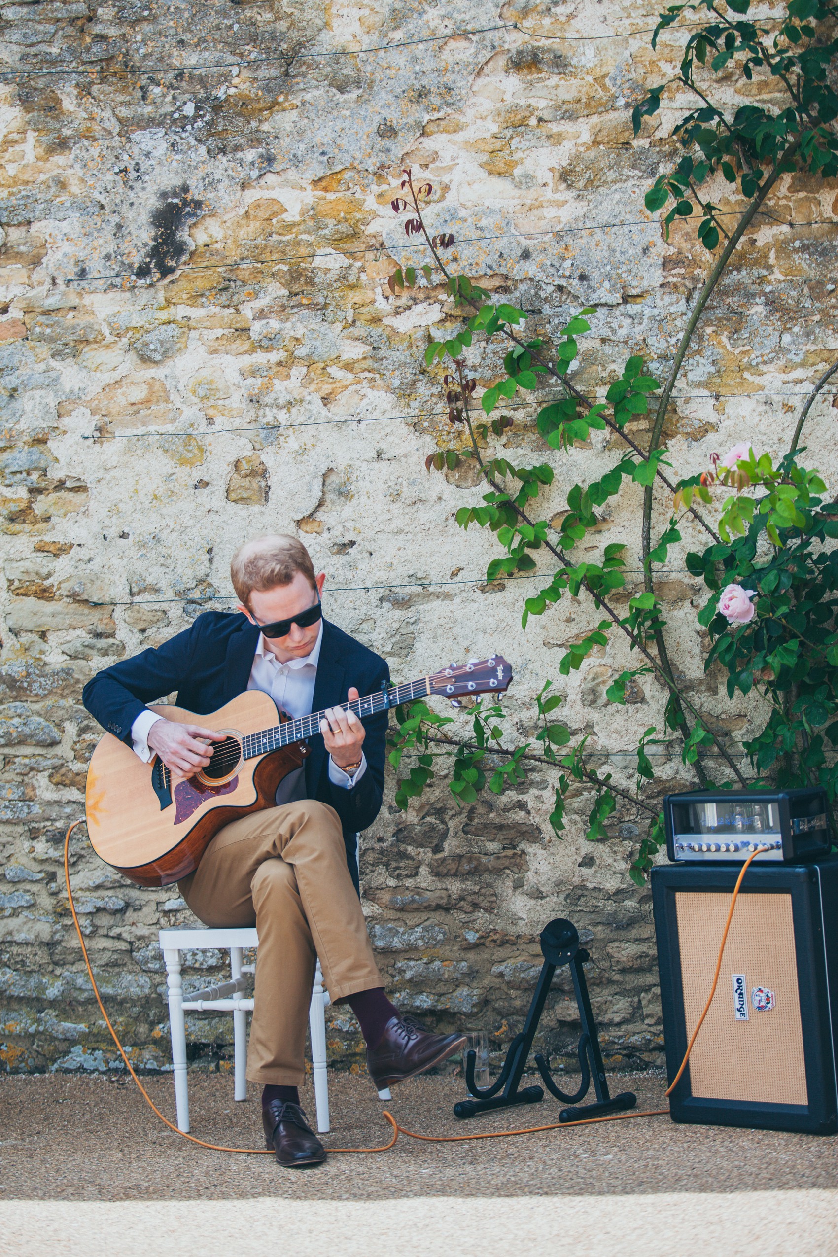 Charlie Brear dress colourful summer garden party wedding Caswell House 14
