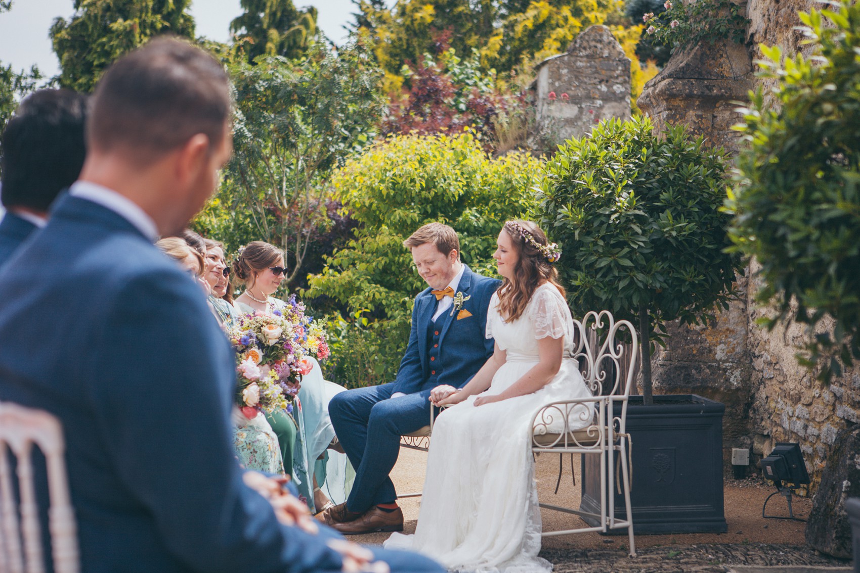 Charlie Brear dress colourful summer garden party wedding Caswell House 16