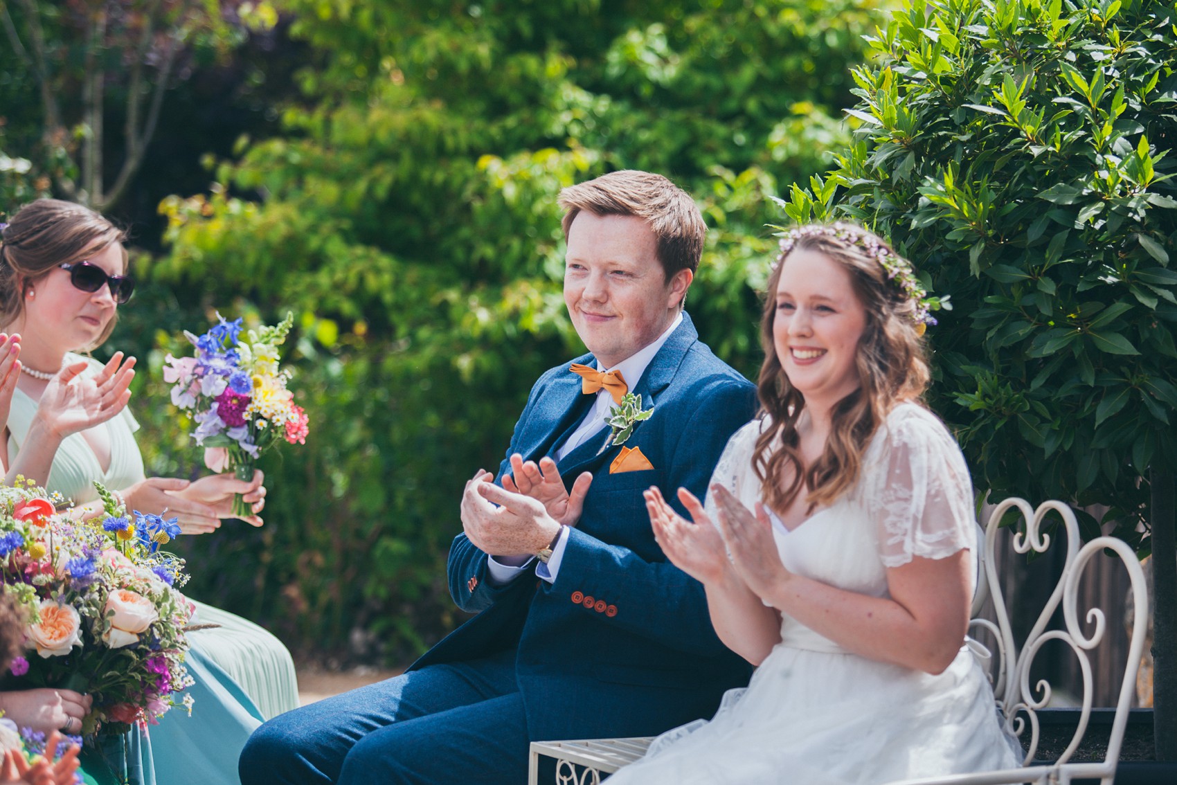 Charlie Brear dress colourful summer garden party wedding Caswell House 17