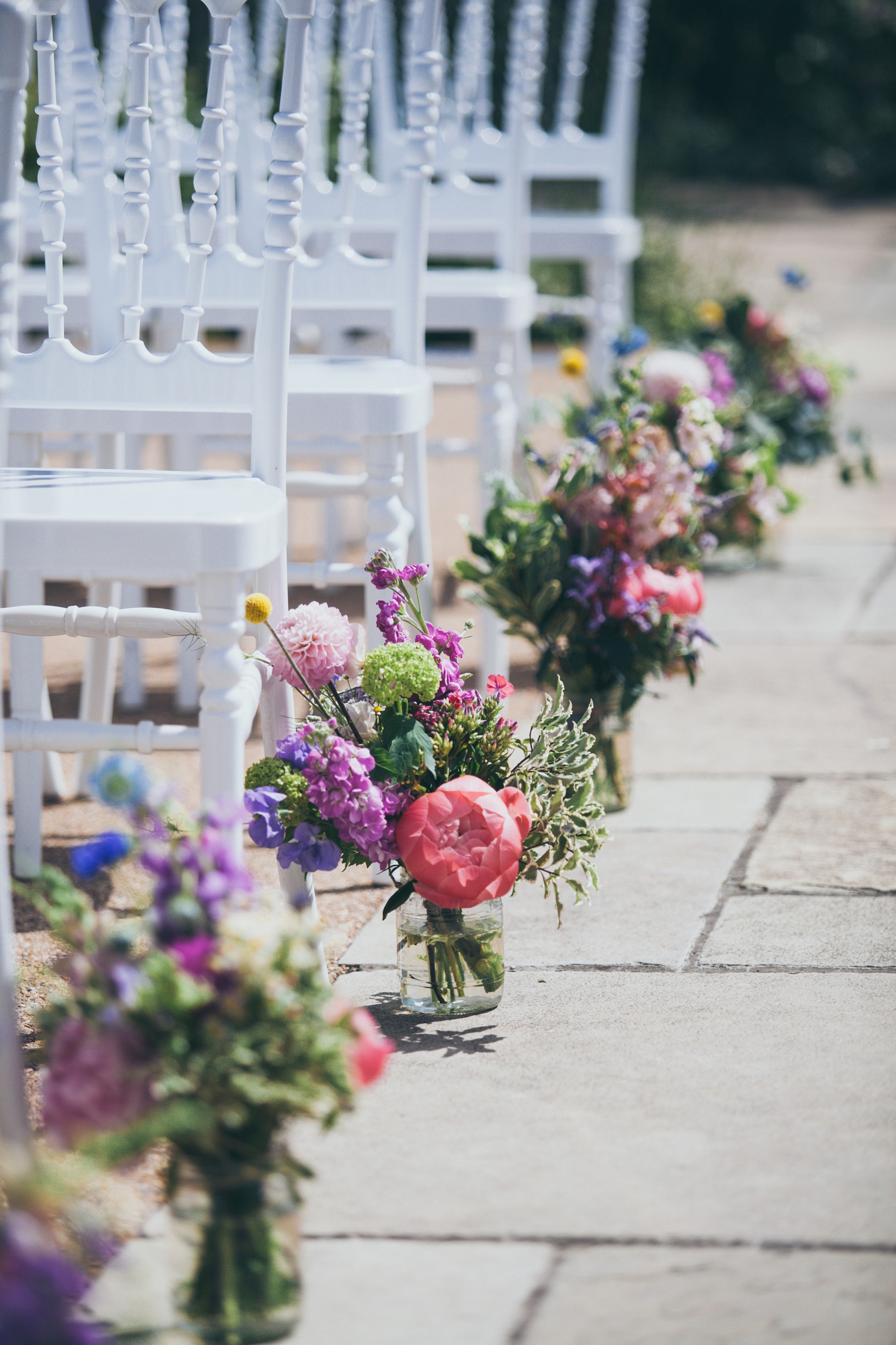 Charlie Brear dress colourful summer garden party wedding Caswell House 2
