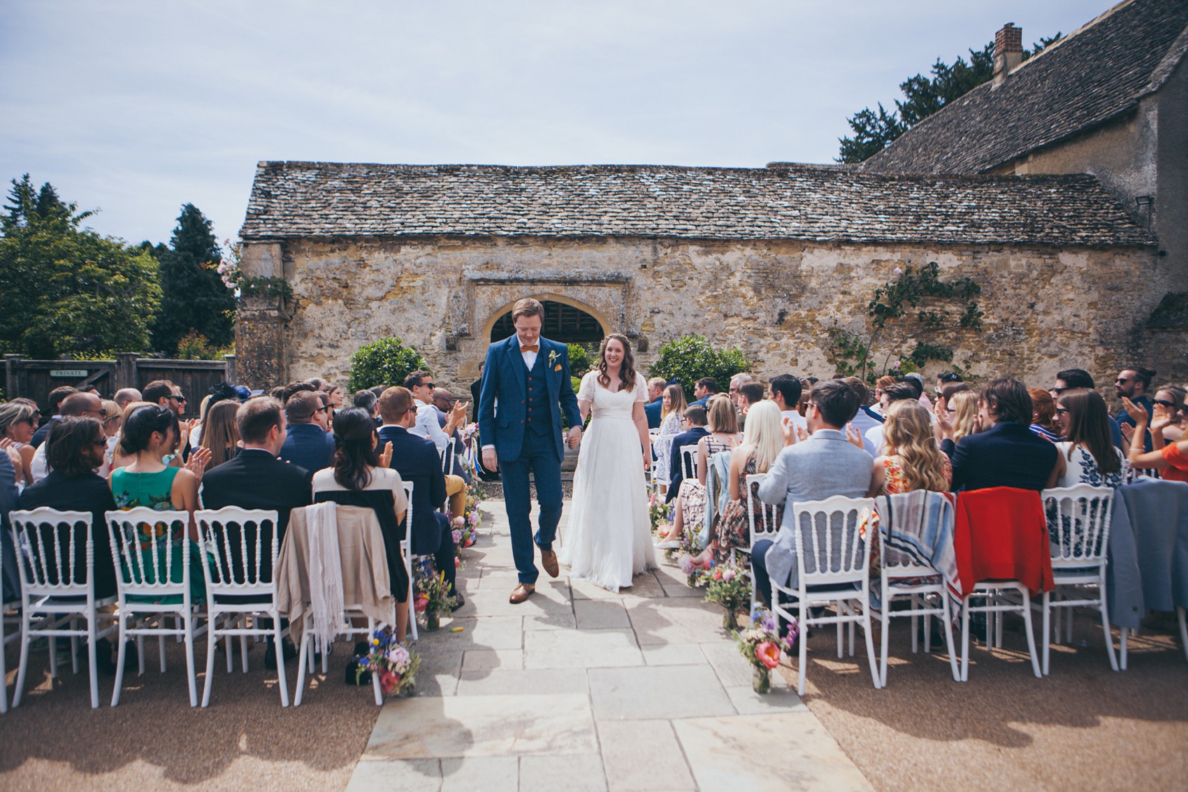 Charlie Brear dress colourful summer garden party wedding Caswell House 20