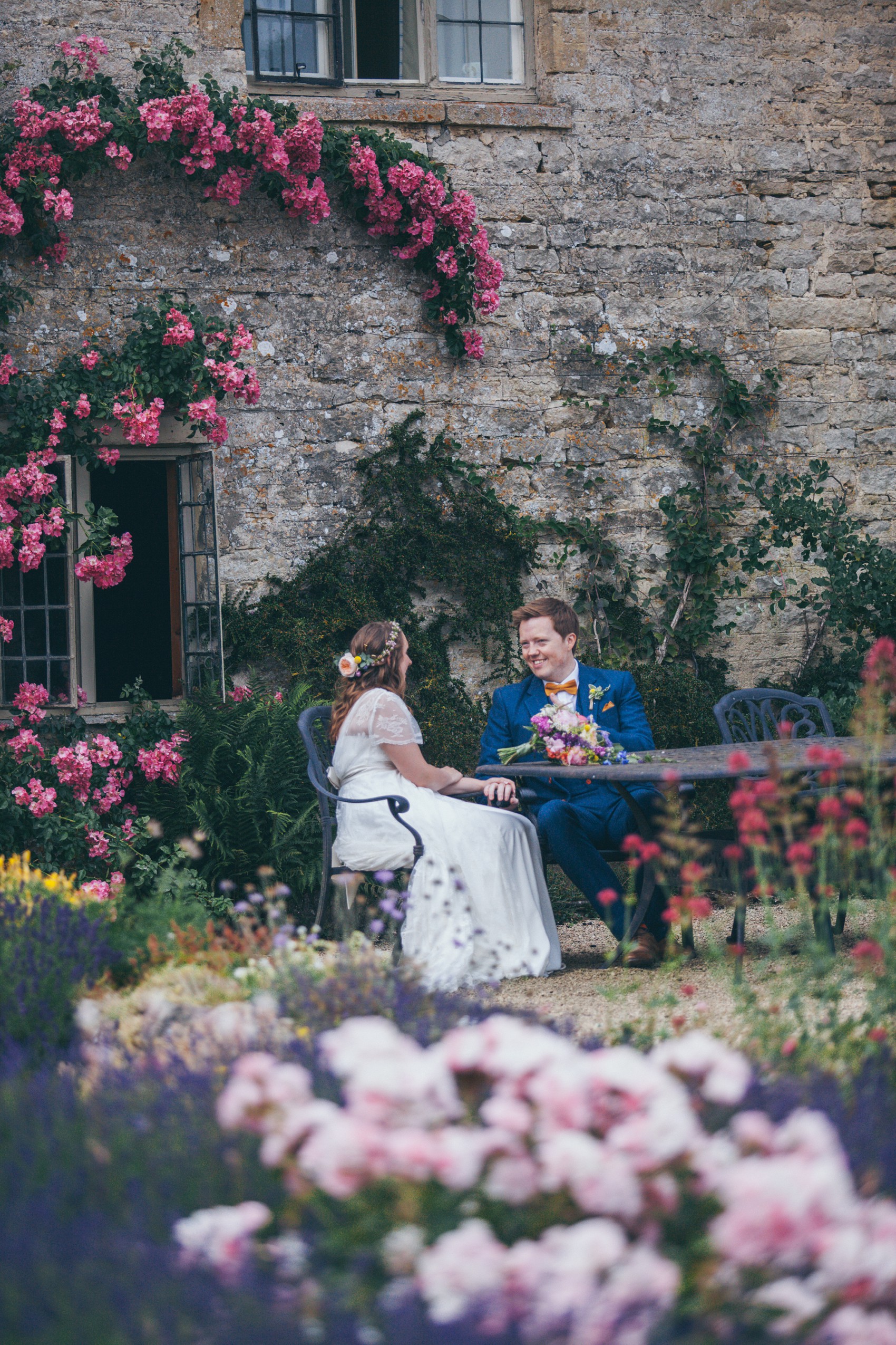 Charlie Brear dress colourful summer garden party wedding Caswell House 28