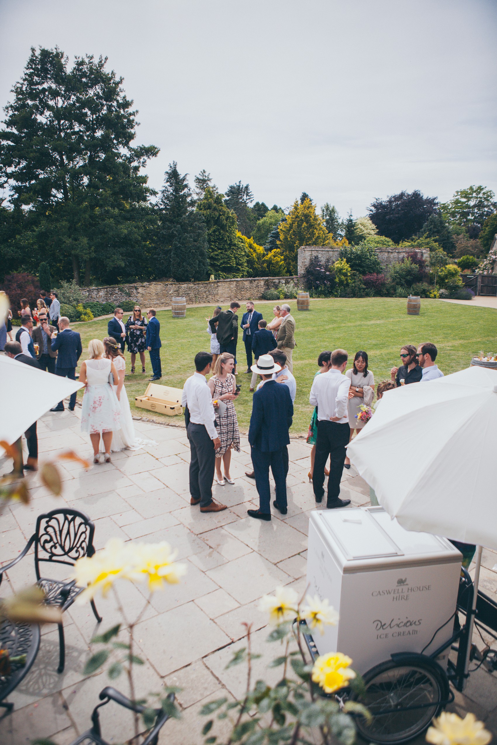 Charlie Brear dress colourful summer garden party wedding Caswell House 30