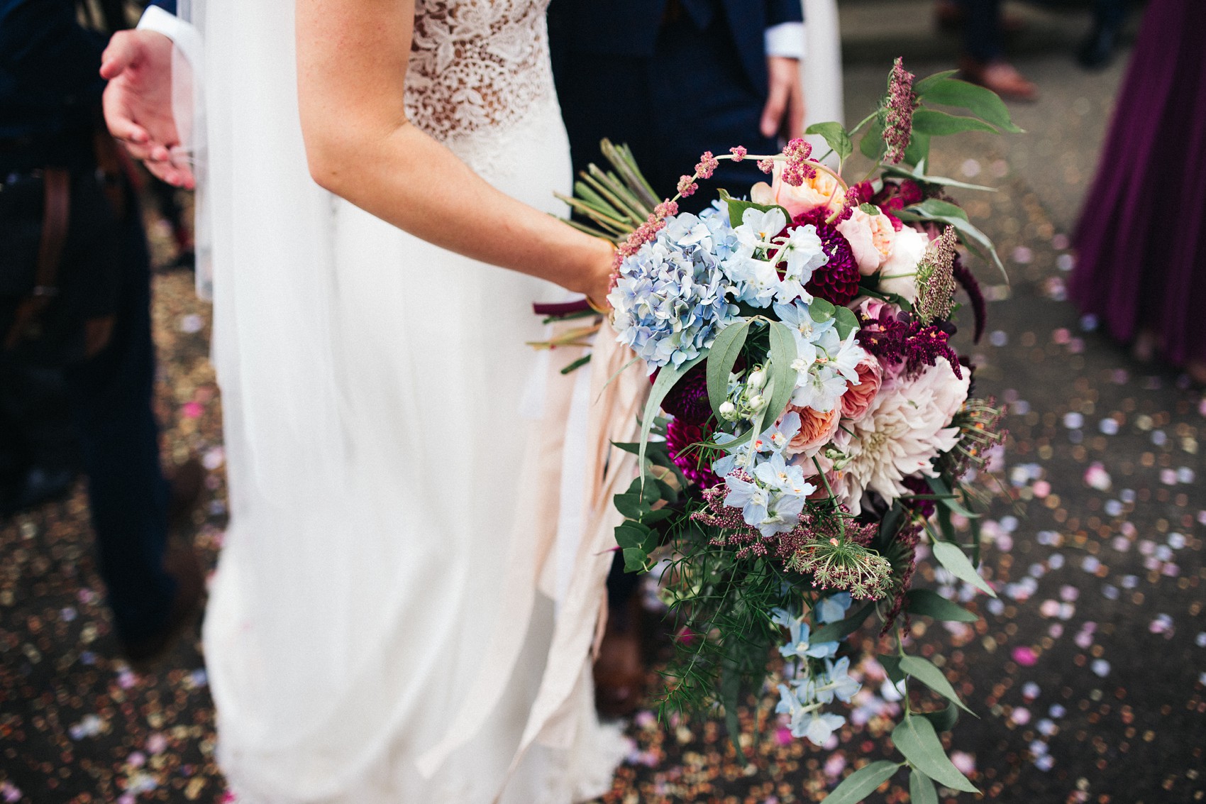 Martina Liana bride colourful flowers Summer wedding  - A Martina Liana Dress with Illusion Tulle for a Bright + Colourful Summer Marquee Wedding in North Yorkshire