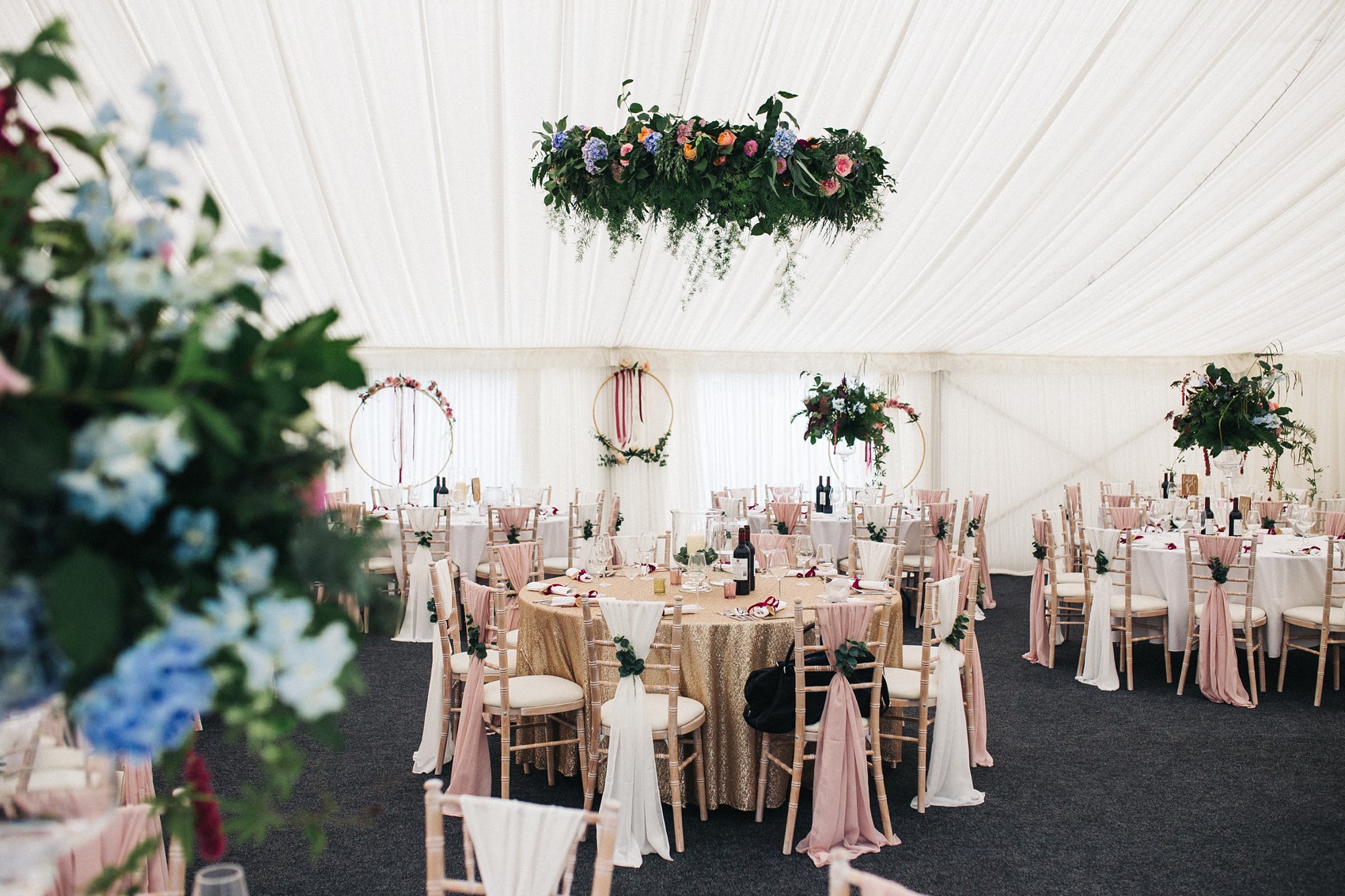 Martina Liana bride colourful flowers Summer wedding  - A Martina Liana Dress with Illusion Tulle for a Bright + Colourful Summer Marquee Wedding in North Yorkshire