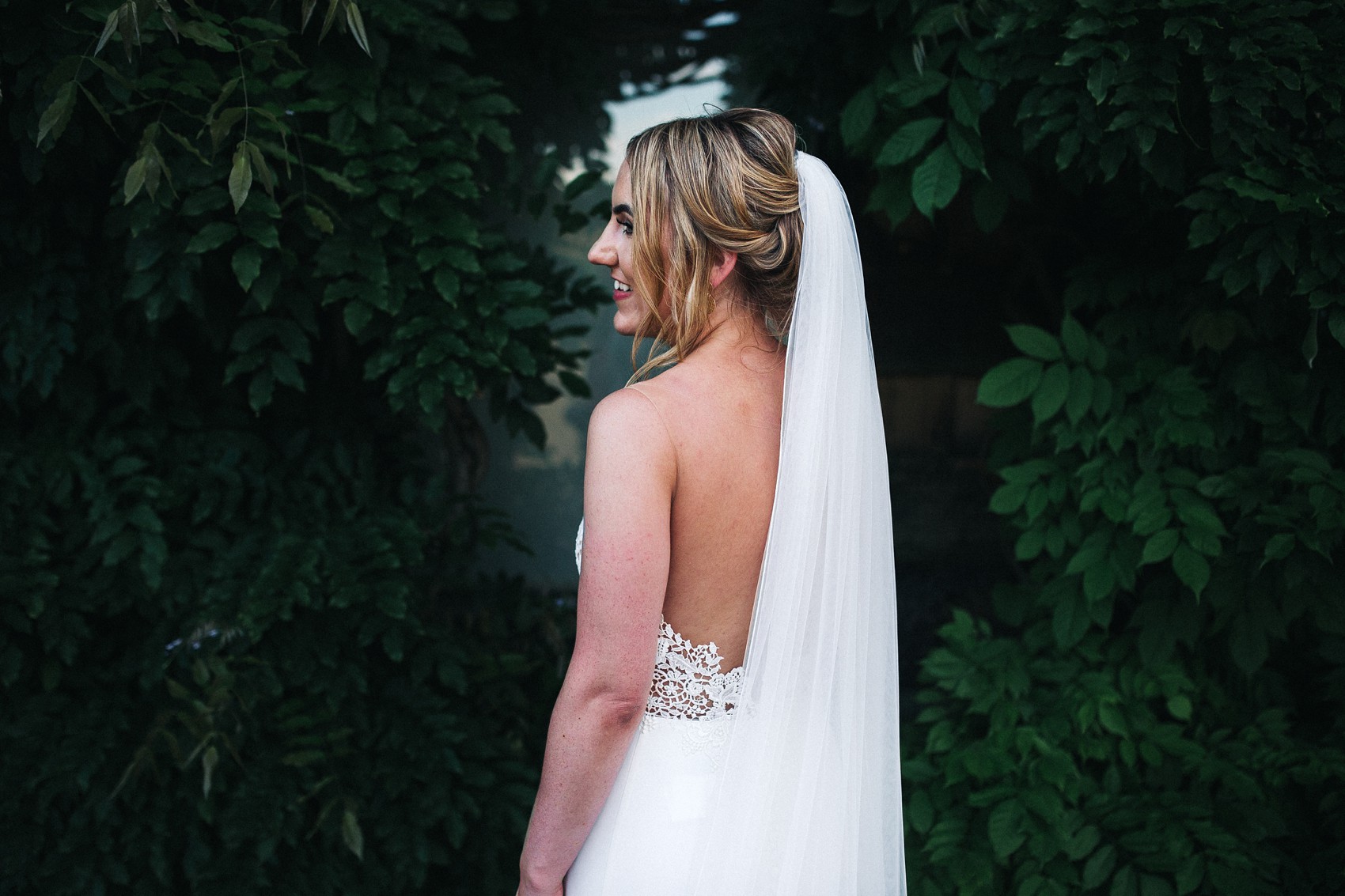 Martina Liana bride colourful flowers Summer wedding  - A Martina Liana Dress with Illusion Tulle for a Bright + Colourful Summer Marquee Wedding in North Yorkshire