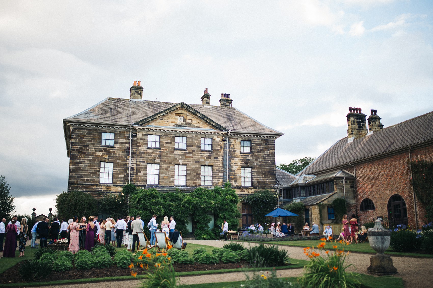 Martina Liana bride colourful flowers Summer wedding  - A Martina Liana Dress with Illusion Tulle for a Bright + Colourful Summer Marquee Wedding in North Yorkshire