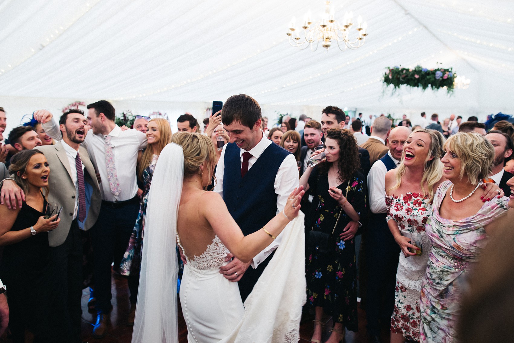 Martina Liana bride colourful flowers Summer wedding  - A Martina Liana Dress with Illusion Tulle for a Bright + Colourful Summer Marquee Wedding in North Yorkshire