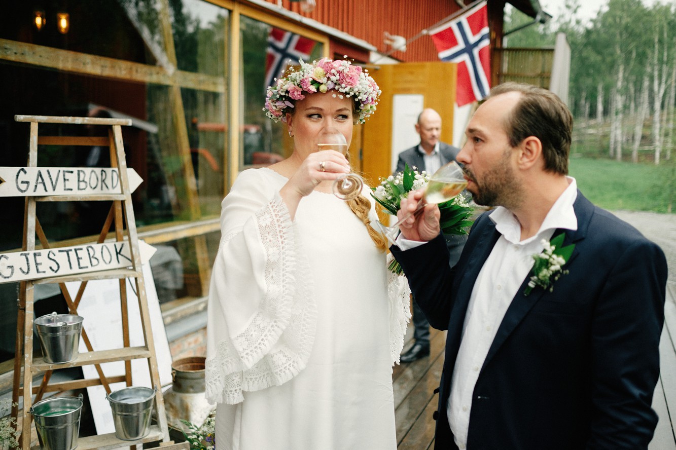  Indiebride London boho s short ethical wedding dress - A 1970's Boho Style  + Ethical Mini Dress by Indiebride London for a Colourful + Rustic Summer Barn Wedding in Norway