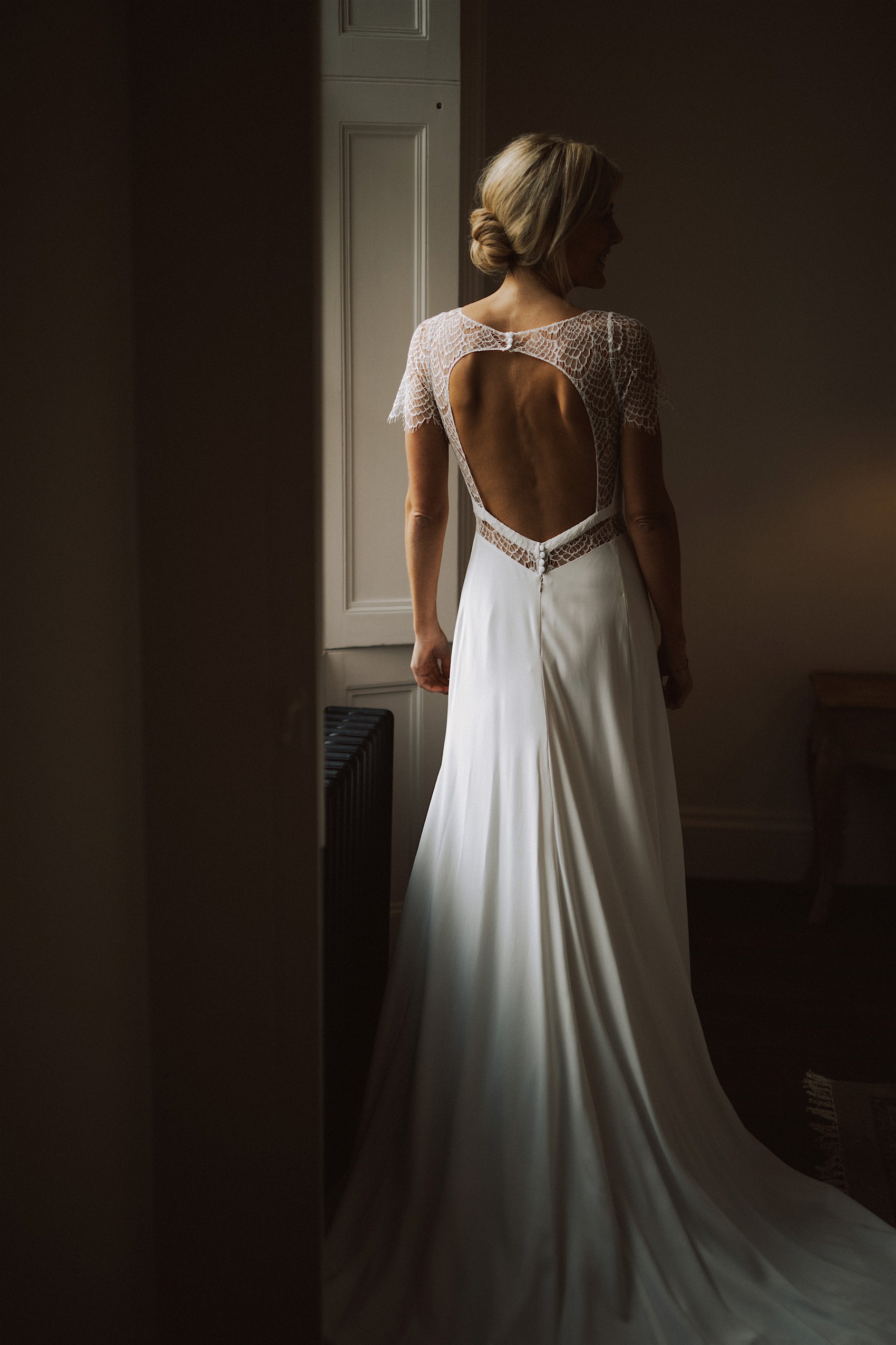 14 Mademoiselle de Guise dress candlelit festive wedding