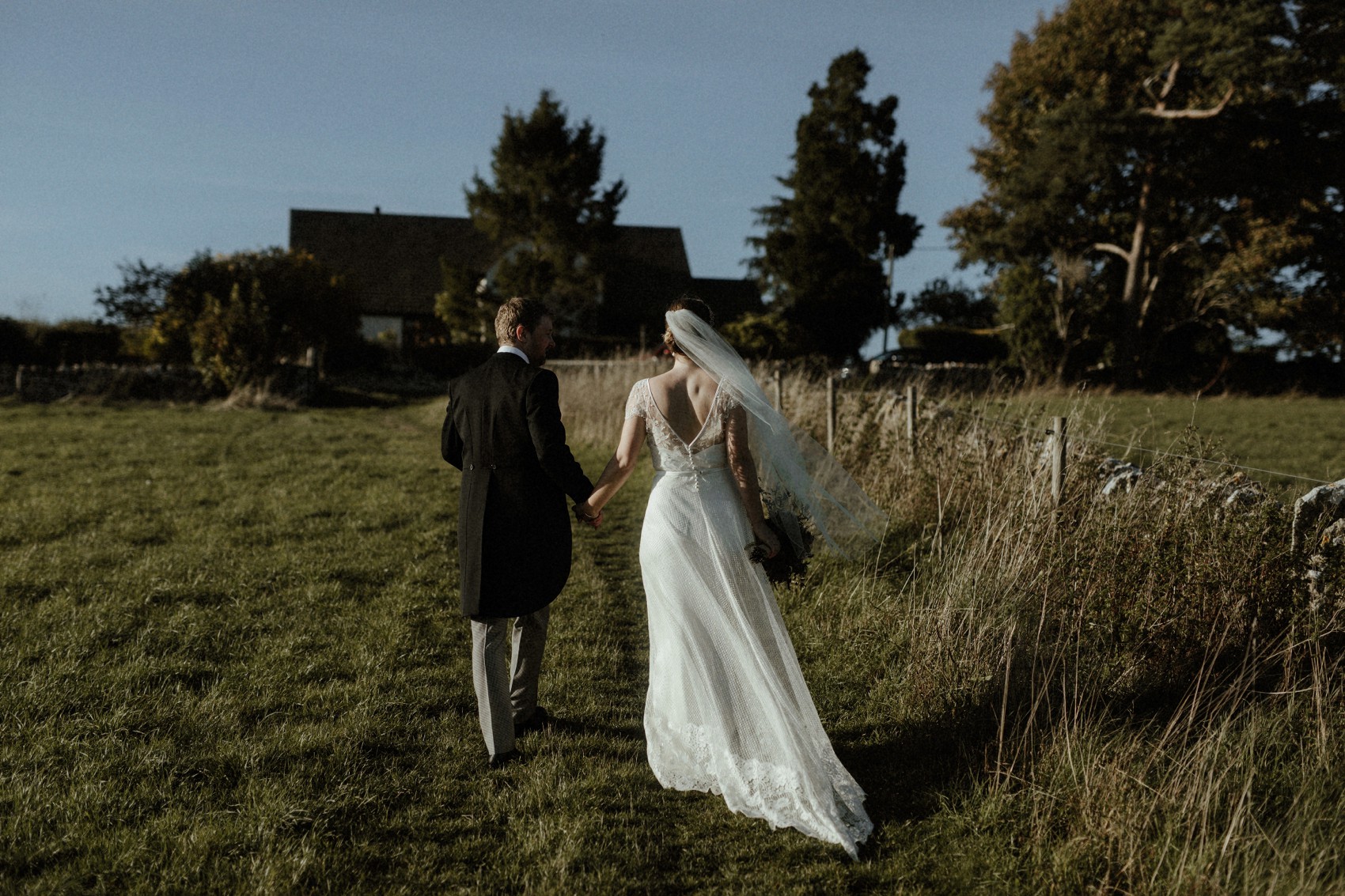  Halfpenny London bride Autumn marquee wedding - A Halfpenny London Dress + Hermione Harbutt Hairband for a Festoon Lights Marquee Wedding at the Family Home