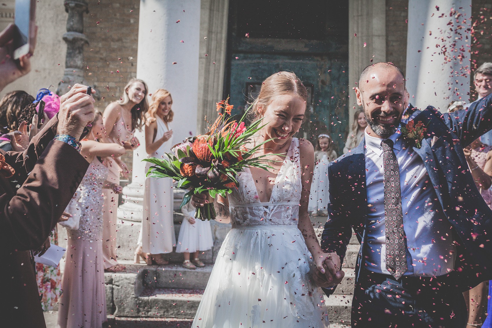 A Vibrant, Modern, Hip + Colourful Brixton Wedding with a bride in Willowby by Watters 8 25 Willowby by Watters colourful wedding Pop