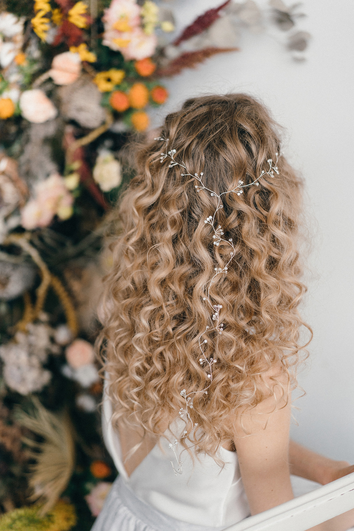 Curly haired bride Celine Y plait by debbiecarlisle.com £ - How To Style Wedding Hair Accessories With Curly Hair, Debbie Carlisle + Top Hair Care Tips for Curly Haired Brides