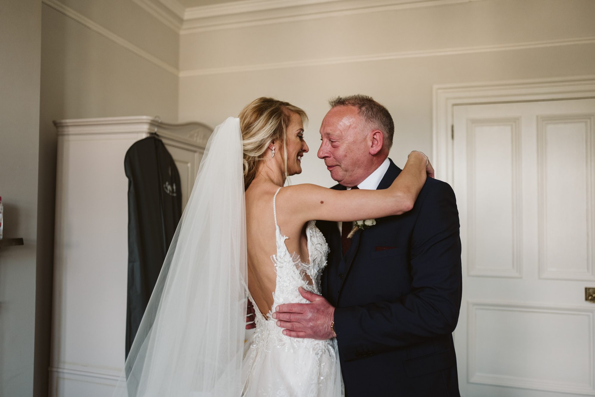 Father and daughter the bride on her wedding day