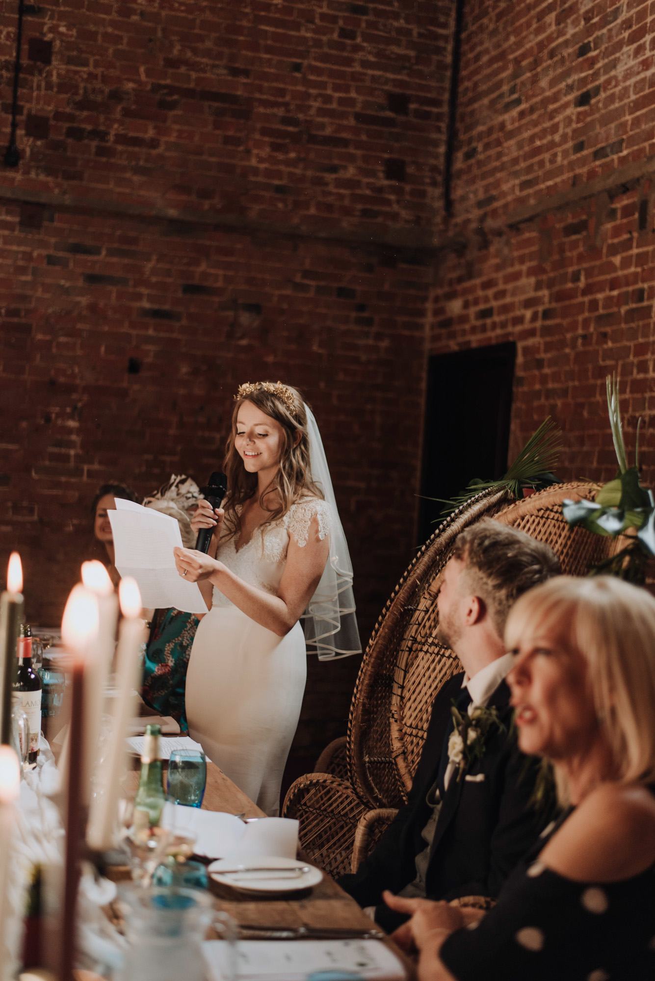 Bride giving a wedding speech - A Stephanie Allin Dress + Bridesmaids in Needle & Thread for a Botanical, Boho Barn Wedding in Norfolk Bride giving a wedding speech
