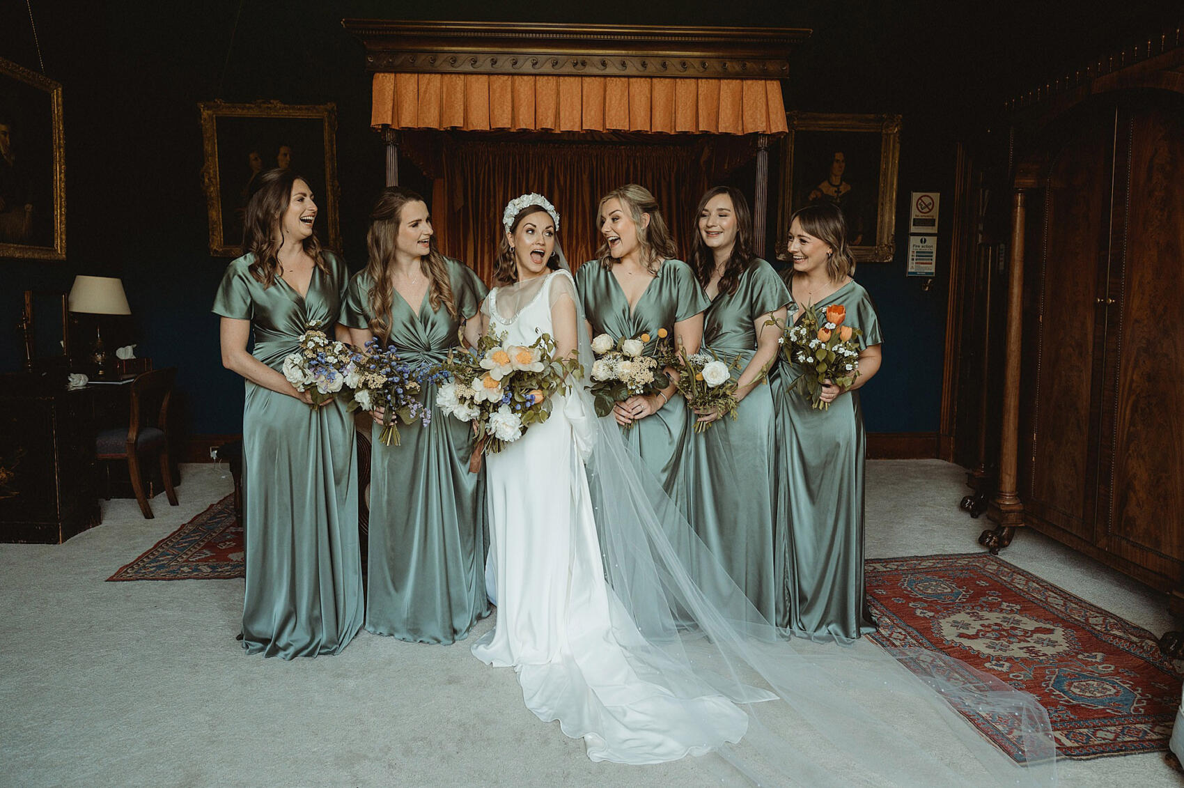 Bridesmaids in sage green dresses THTH