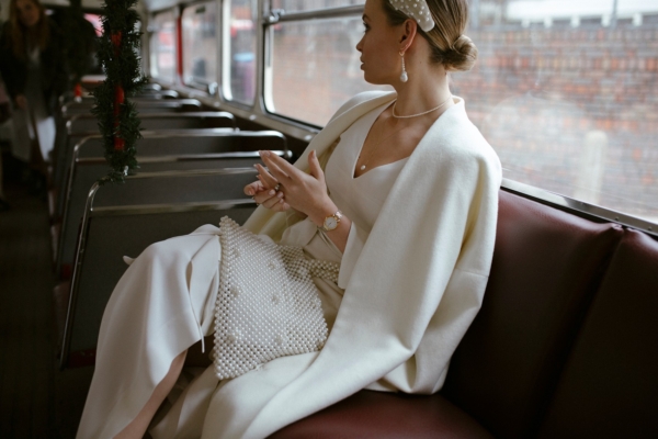 A Chic White Coat + Lele Sadoughi Pearl Headband for a Cool, Monochromatic Winter Wedding at Clissold House