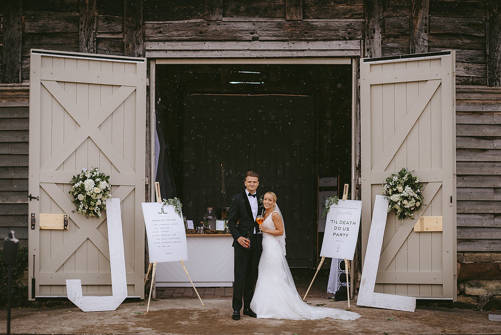 Elegant Caroline Castigliano bride  - A Caroline Castigliano Dress with a Lace Overskirt for a Contemporary Classic Black + Gold Barn Wedding