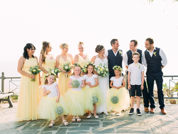 A Spectacular Cliff-Top + Sea View Wedding at Il Faro in Italy, with a Pregnant Bride in a Grecian Inspired Dress