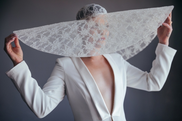 A Bride in a Modern White Tuxedo + Oversized Wide Brim Hat