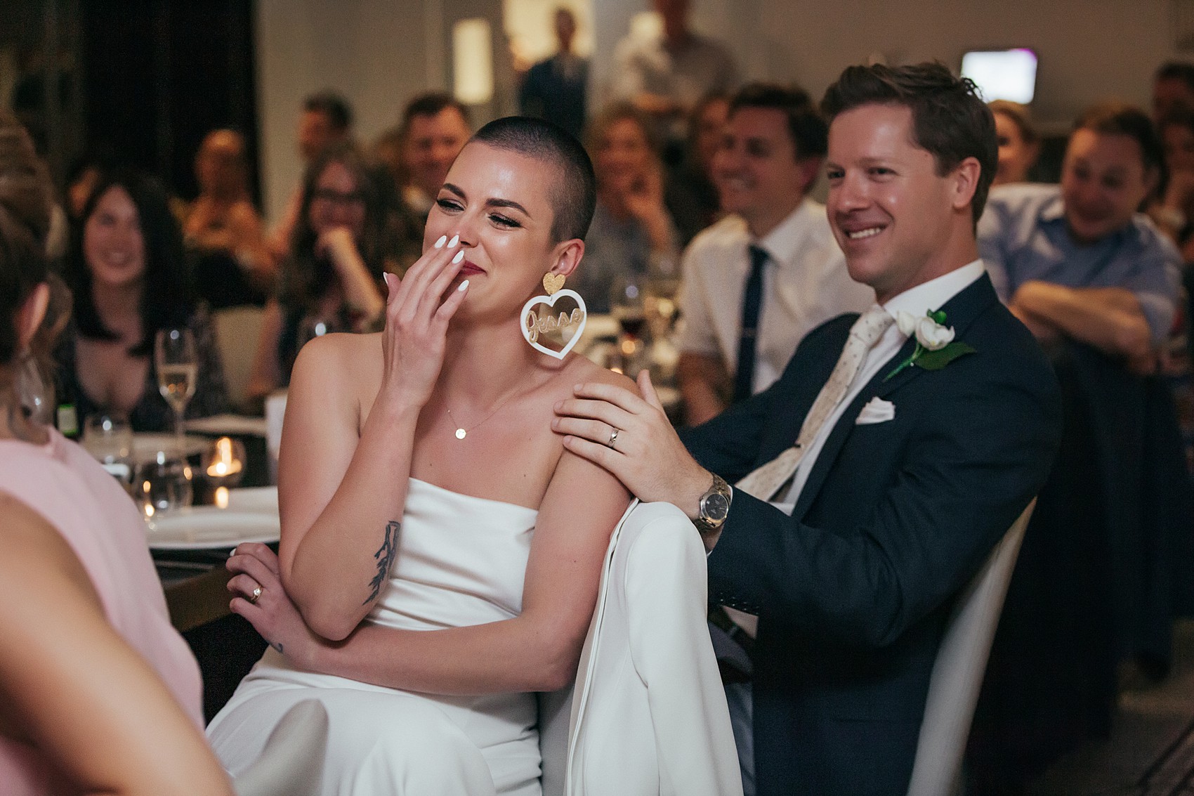 Bride in white tux oversizesd hat 59