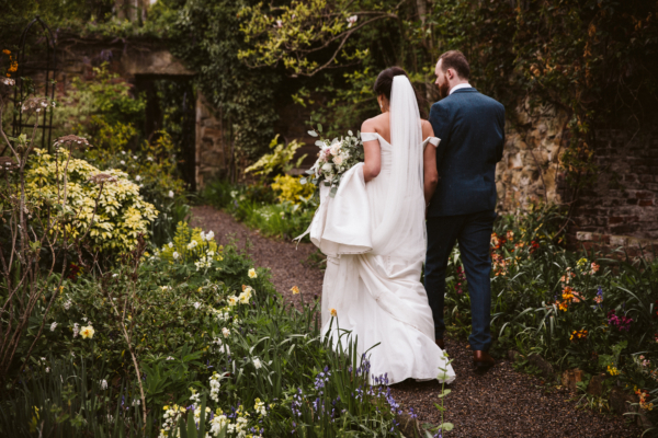 A Modern Off-the-Shoulder Dress by Essense of Australia for a Travel Inspired Wedding at Three Historic North East England Venues