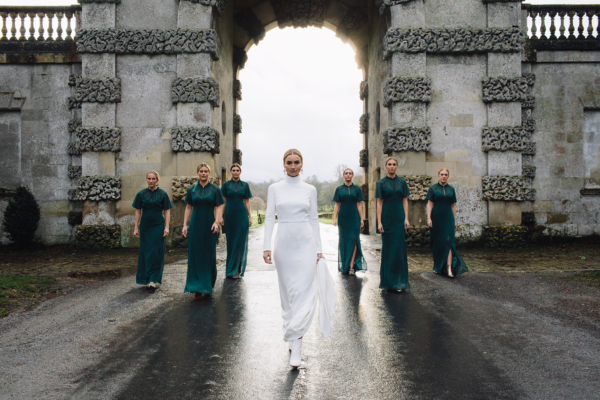 A Long Sleeved & Backless Andrea Hawkes Dress for a Cool, Contemporary, Candlelit + Cosy Christmas Wedding in Wiltshire