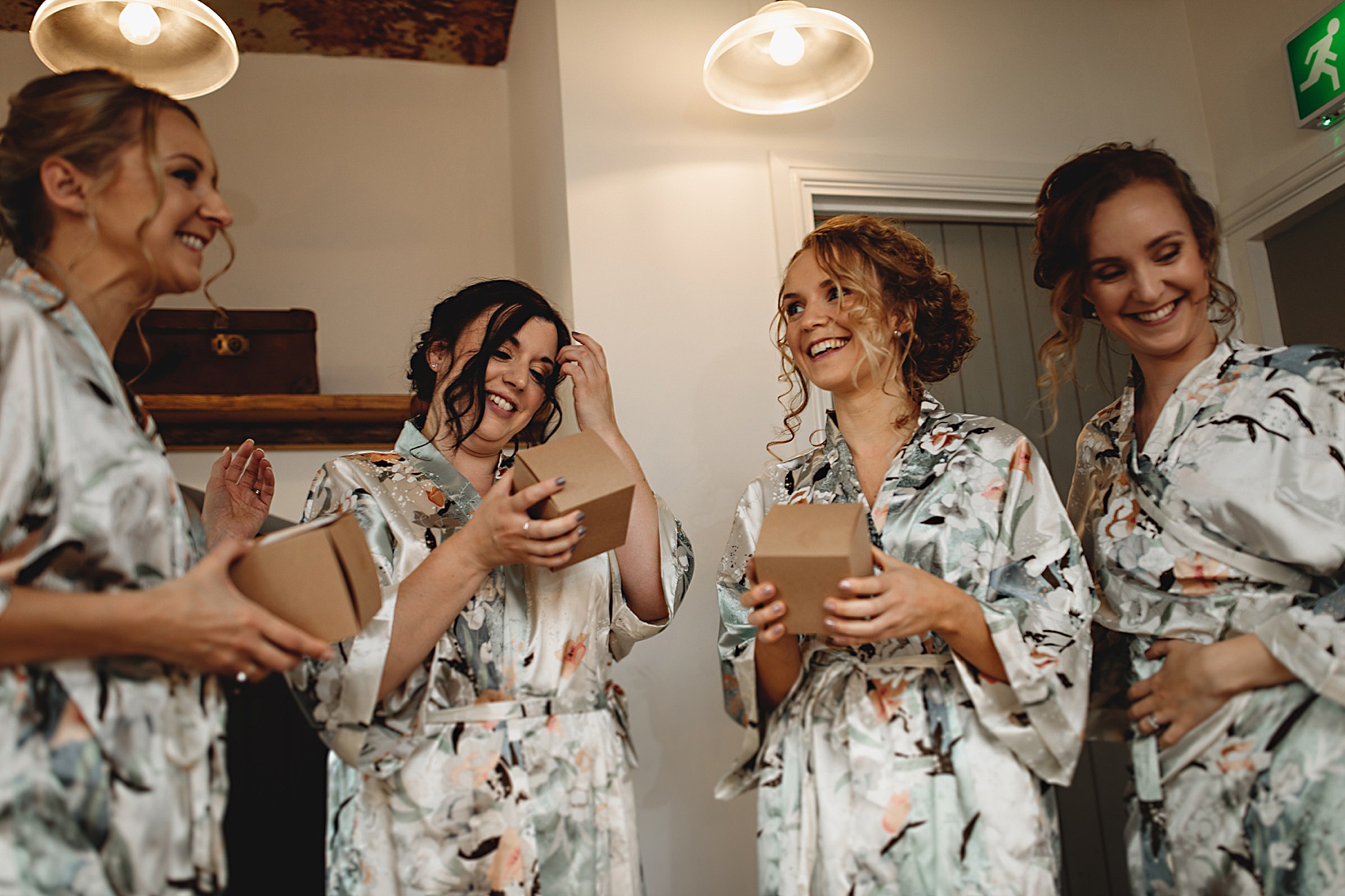 Bridesmaids with boxed gifts