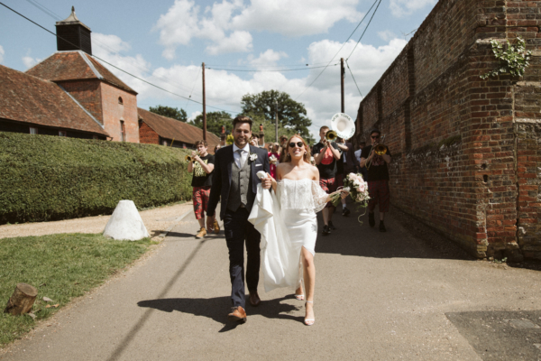 A Modern, Bohemian Tipi Wedding in the Surrey Countryside with a Brass Band + Bridesmaids in Peach