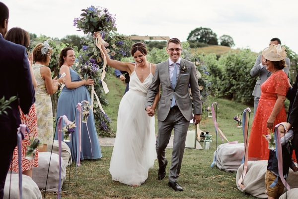 An Evening Jumpsuit by Velvet Johnstone for a Summer Barn Wedding at an Essex Vineyard