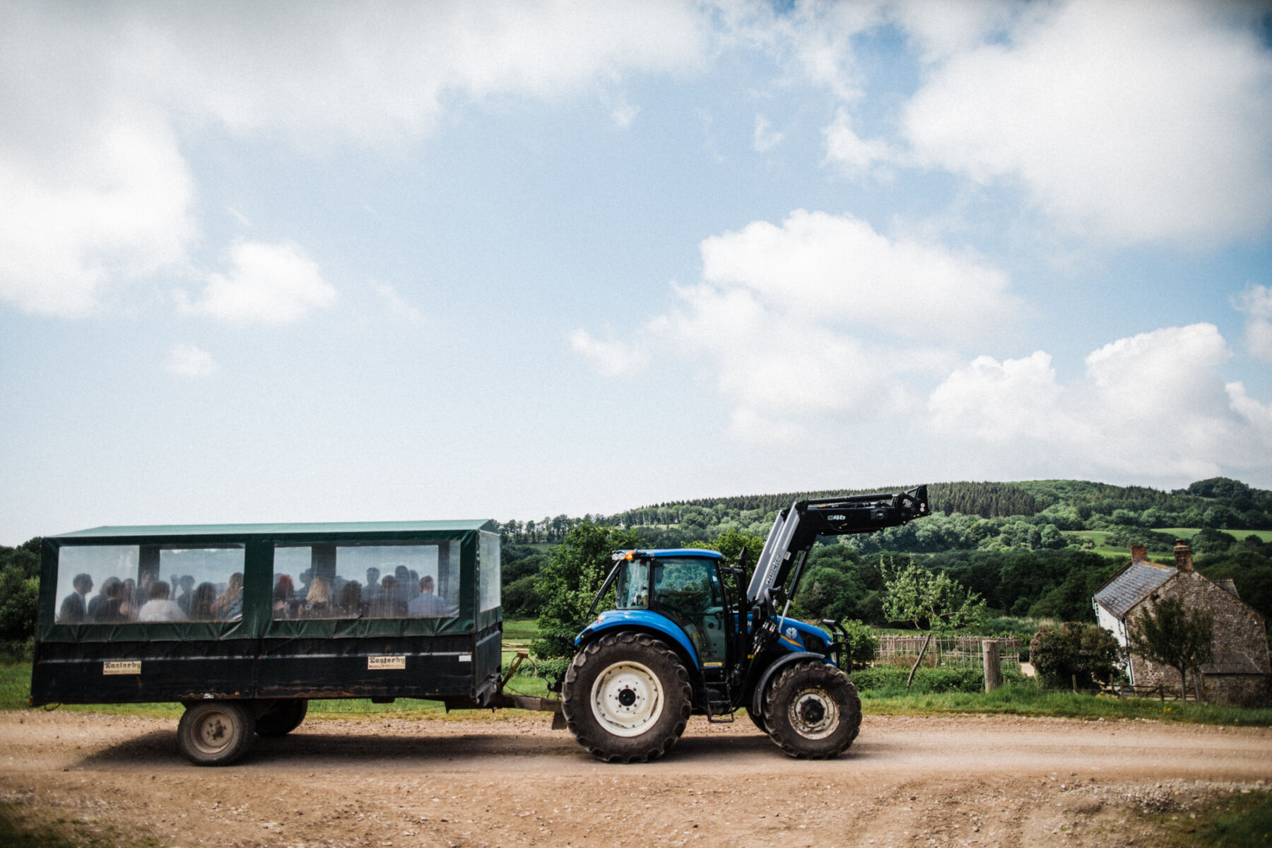 Tractor carrying weddin guests