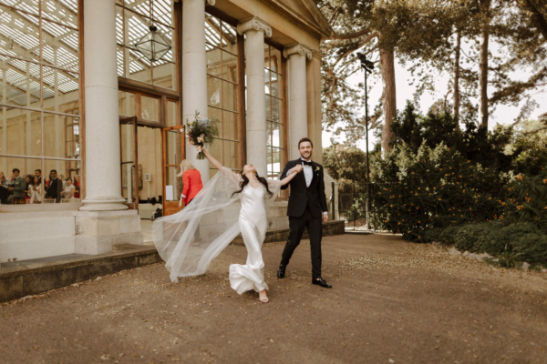An Alexandra Grecco Cape & Ghost Dress for a Glamorous Black Tie & Botanical Wedding at Kew Gardens