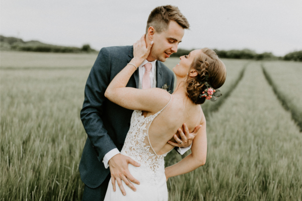 A Sexy, Backless Enzoani Dress for a Modern Bohemian Barn Wedding and an Outdoor Ceremony
