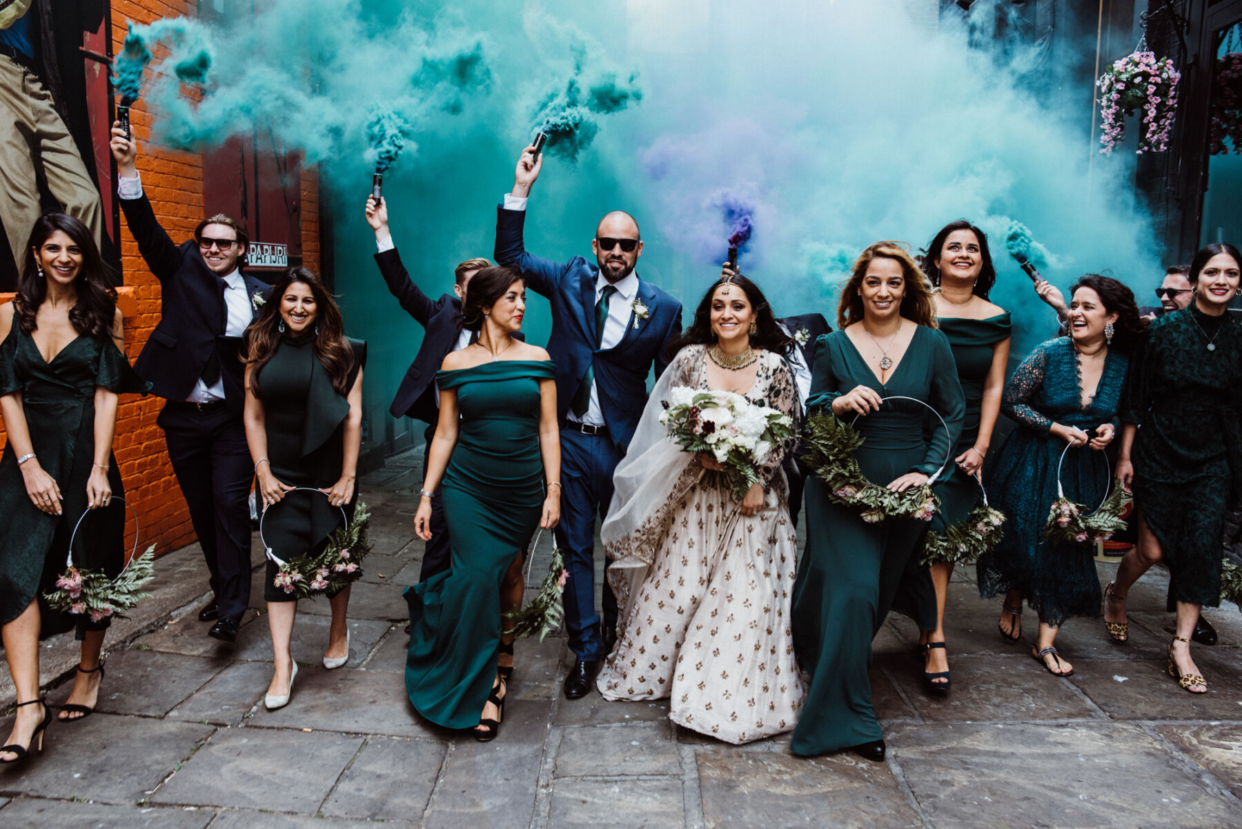 Celebrating The Forever Closed Ace Hotel London with a Beautiful Bollywood Inspired Wedding With 7 Bridesmaids & Blue Smoke Bombs 1 bluel green wedding smoke bombs