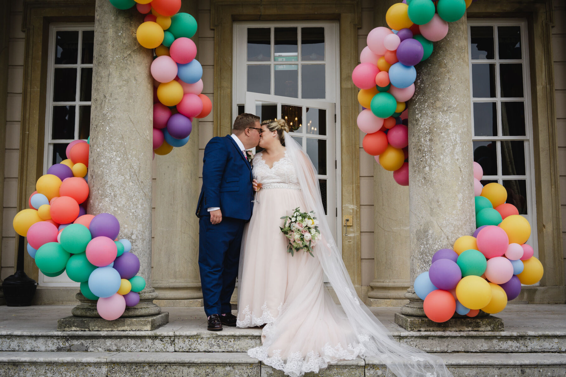 A Balloon Filled Buxted Park Wedding with a Bride in a Blush Pink