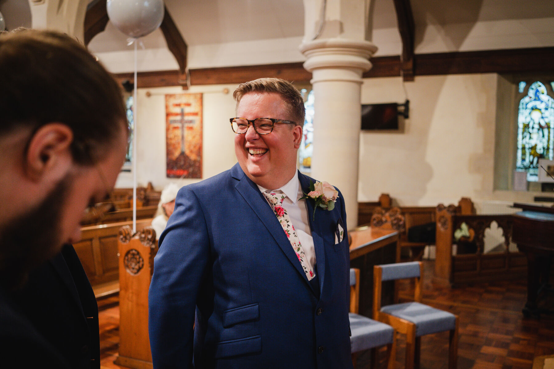 Groom in blue suit