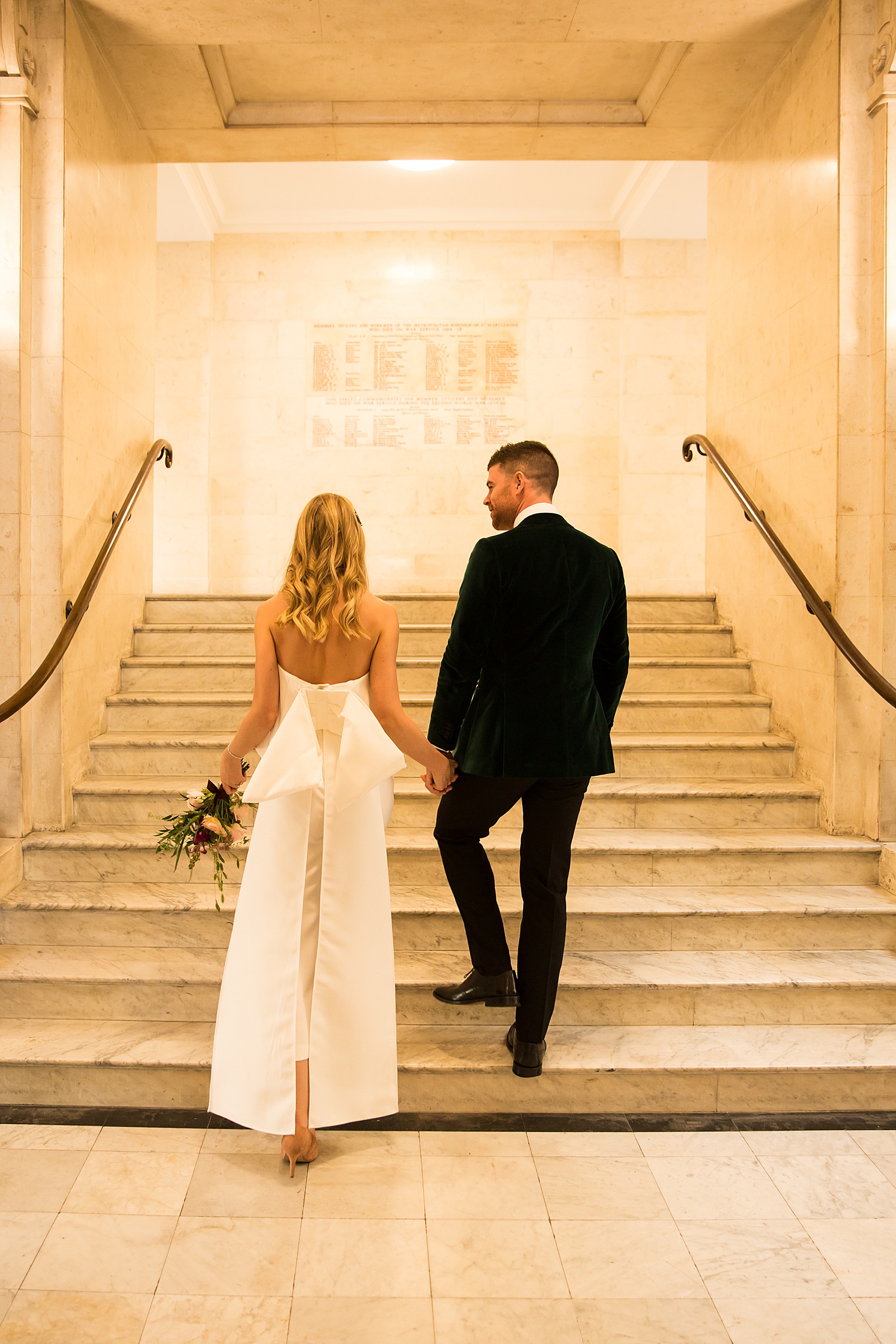 An ASOS Bridal Jumpsuit with Oversized Bow and a Groom in Green Velvet Tux for a Stylish Intimate London Wedding at Old Marylebone Town Hall Love My Dress UK Wedding