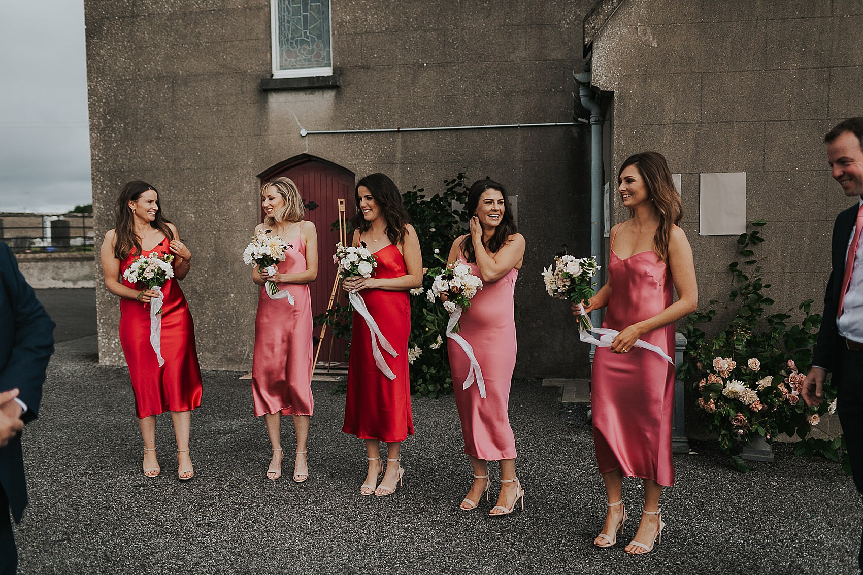 The Own Studio bridesmaids dresses in pink and red