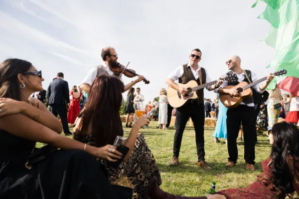 Festival event with roaming musicians, planned by Salt and Scent Events. Photography by Sam Churchill