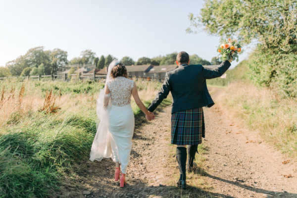 A Pratis Barn Wedding & Ceilidh for a Bride in David Fielden & Her Bridesmaids in Peach Coral Rewritten Dresses
