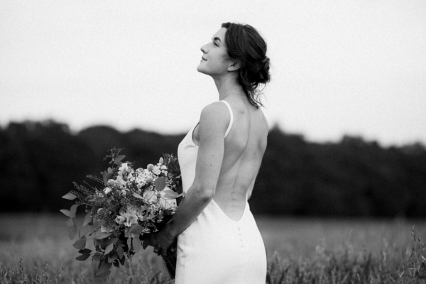 A Low Back Dress by Made With Love Bridal, for an Italian Inspired Wedding at Stone Barn in Cheltenham