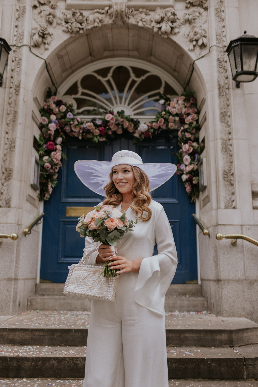 26 Bride in a wide brim hat Chelsea wdding