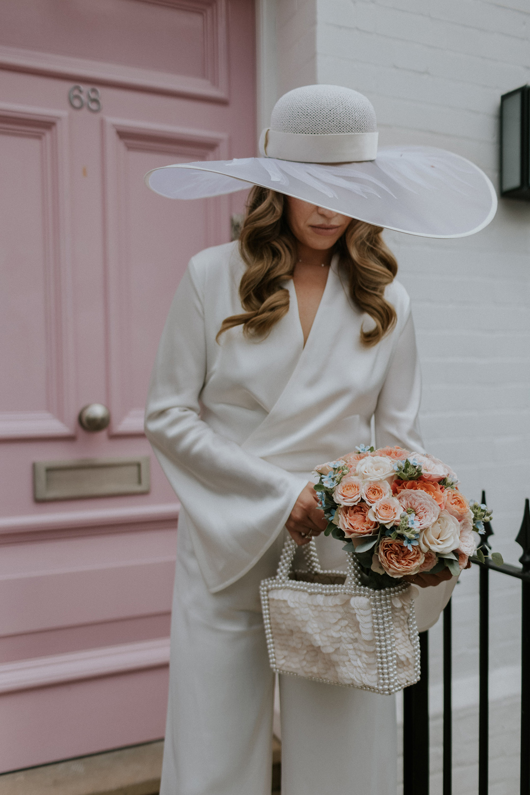 31 Bride in a wide brim hat Chelsea wdding