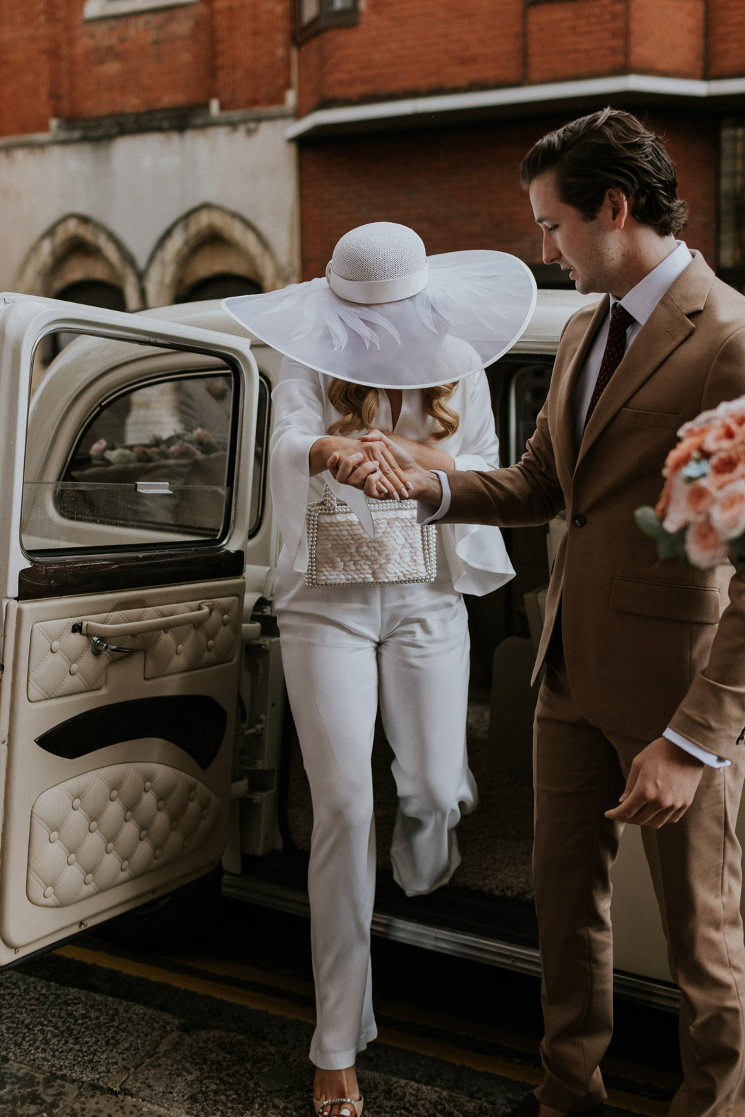 A Bianca Jagger Inspired Bride in an Awon Golding Wide Brim Hat, and her Intimate Chelsea Old Town Hall Wedding Love My Dress, UK Wedding Blog, Podcast, Directory and Shop