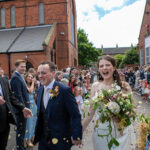 Bride and groom in confetti moment