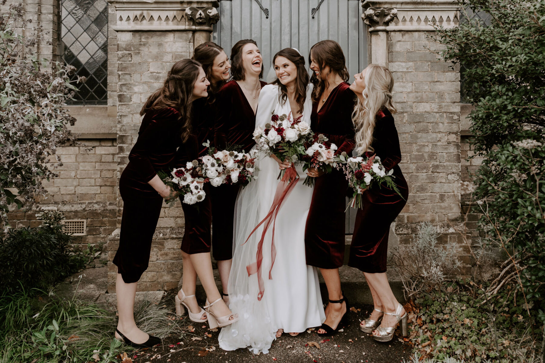 Bridesmaids in dark red velvet