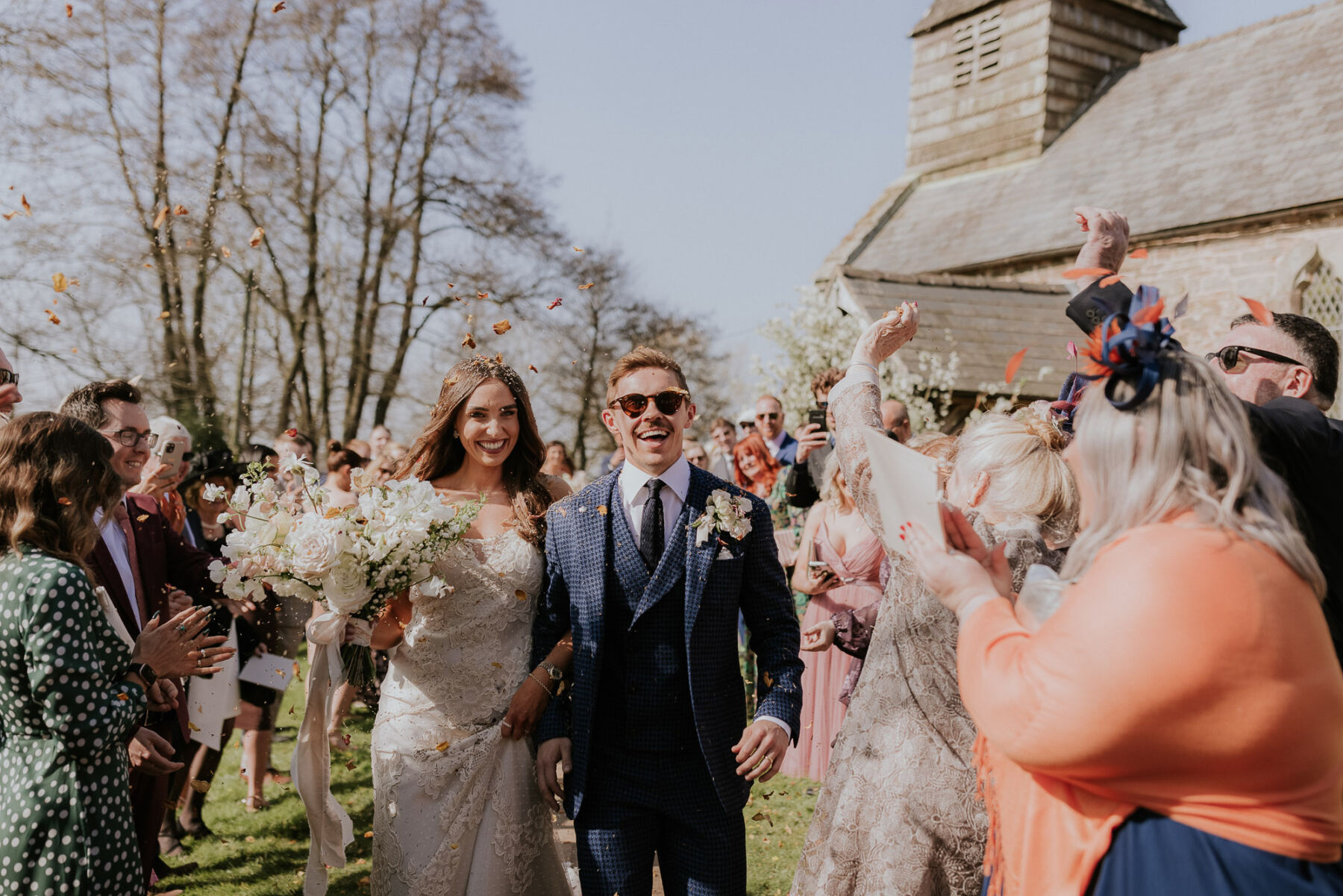 Bex in David Fielden for her Dewsall Court Wedding Full of Warm Neutral Tones 3 Dewsall Court confetti photography