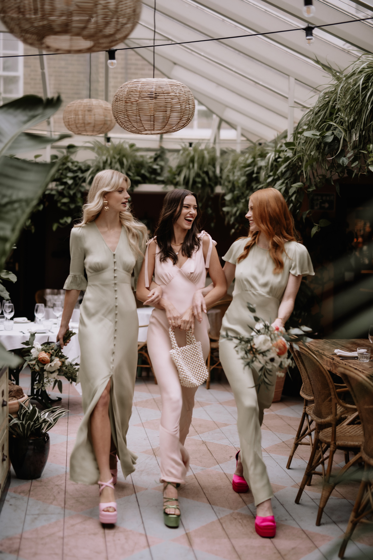 Bridesmaids in sage green dresses