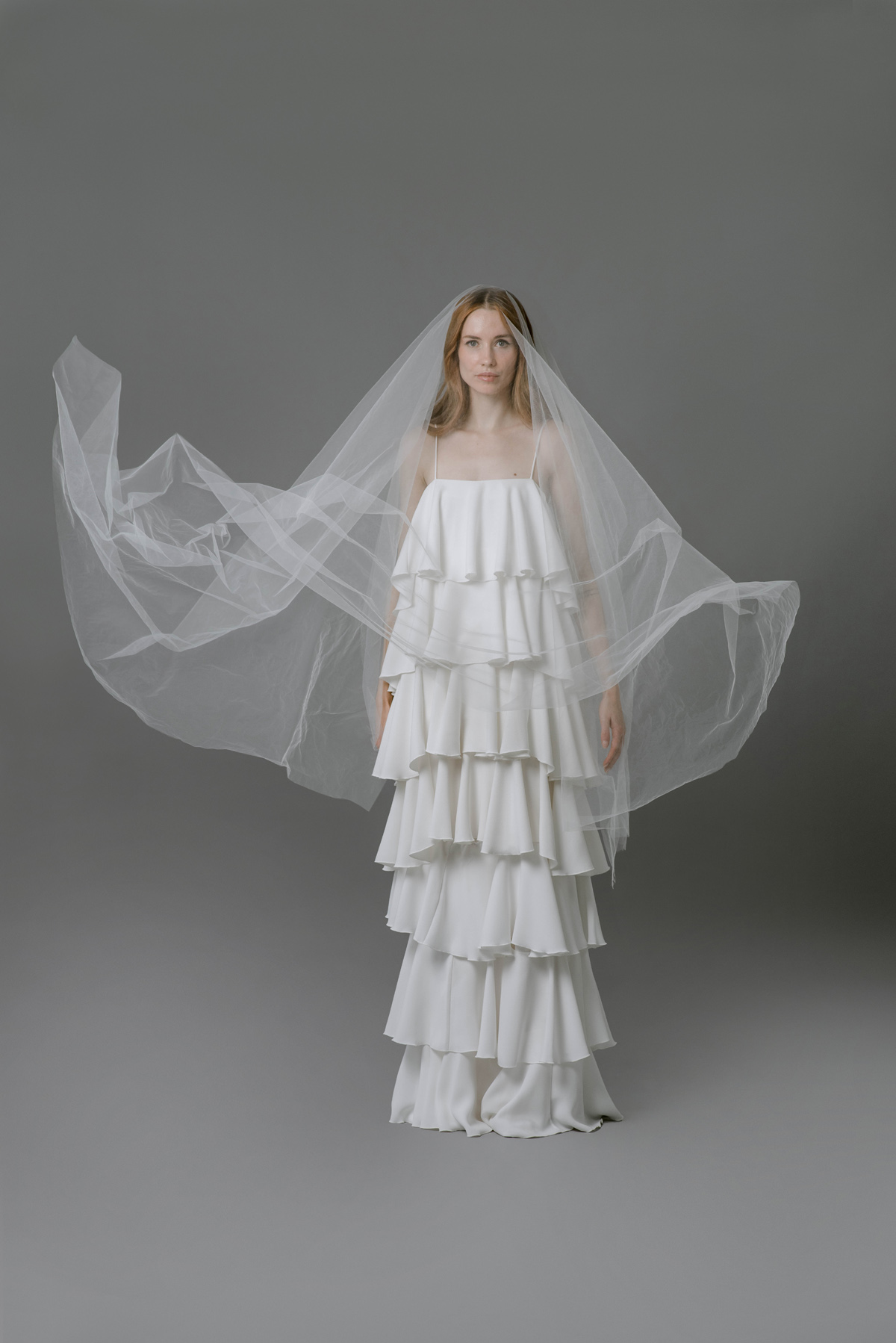 Tiered wedding dress by Rita Colson